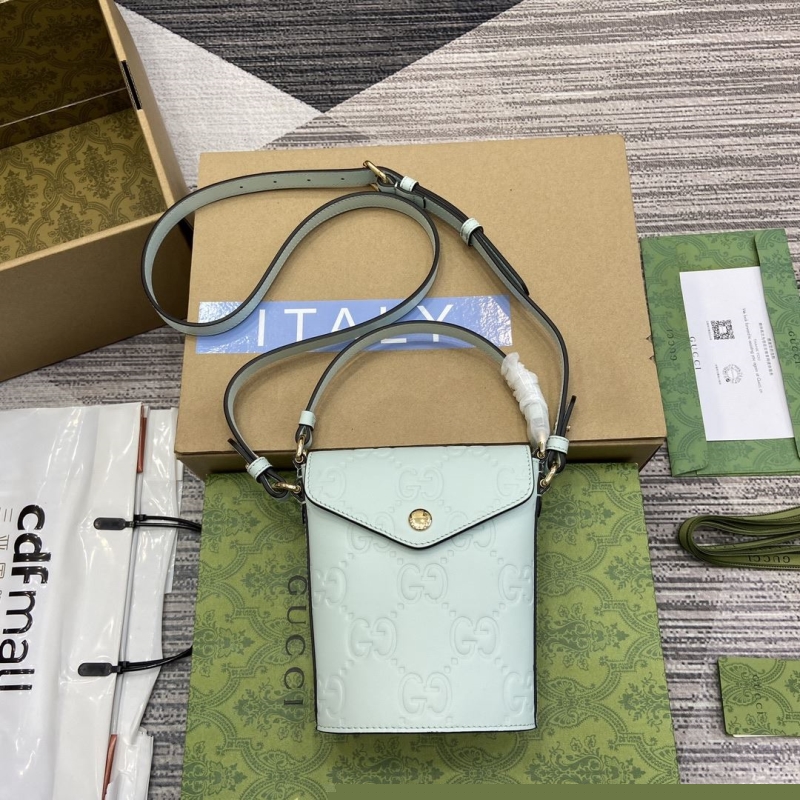 G*u*i top handle bags